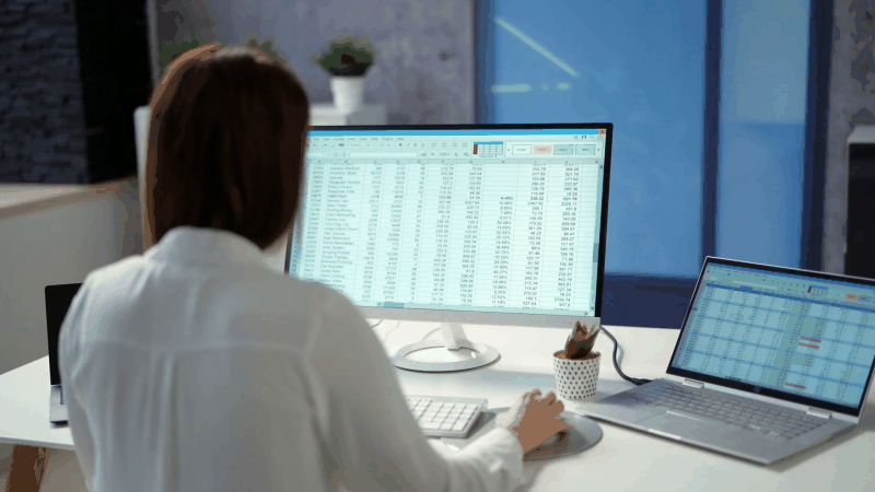 GIF of local gov employee on computer using Envisio software's cascade planning function for their strategic plan