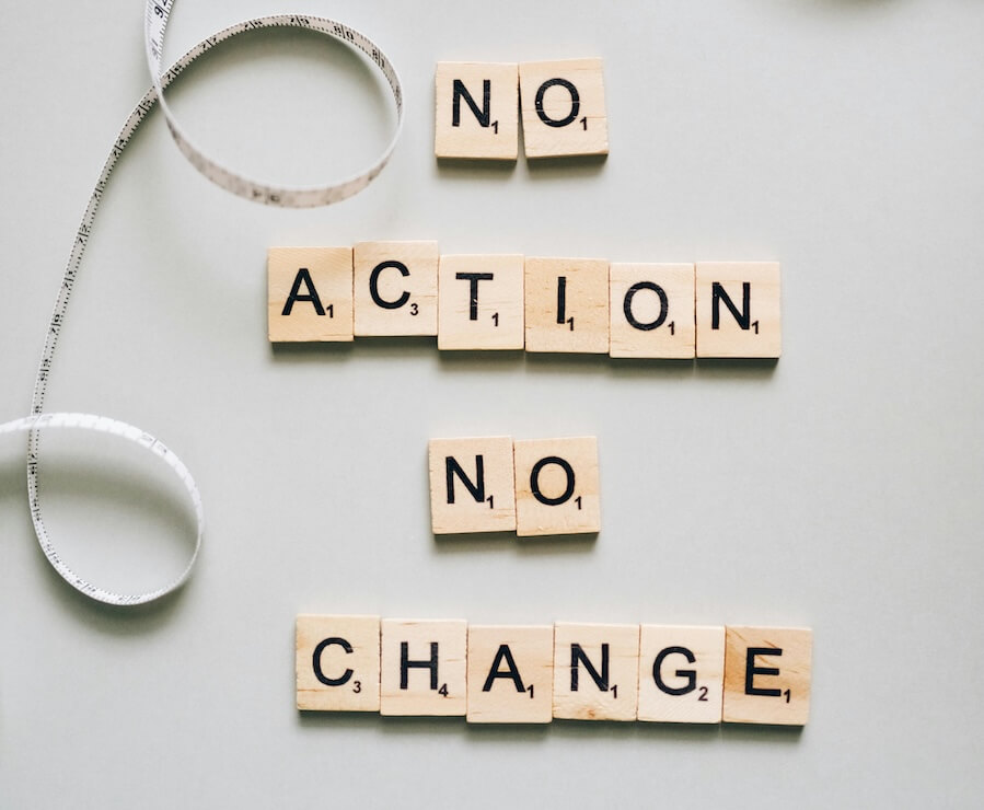 Image showing Scrabble tiles spelling our "No Action, No Change."