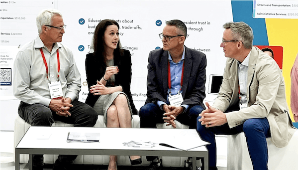 Image of govtech leaders discussing local government budgeting at press conference