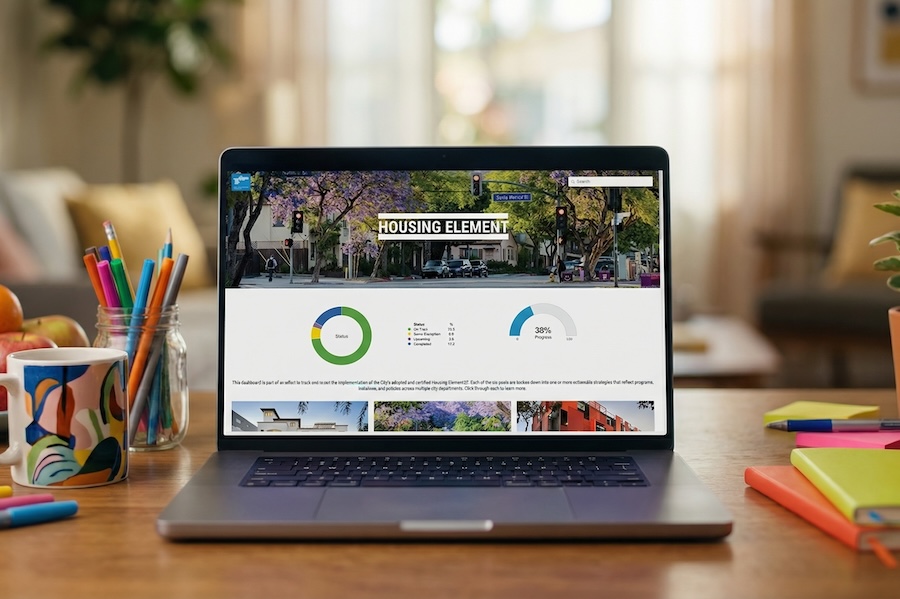Image of an affordable housing dashboard on a laptop screen on a desk.