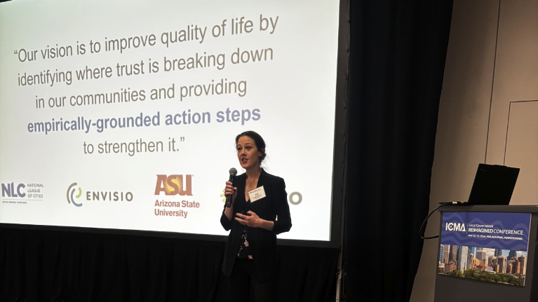 Photo of Liz Steward from Envisio presenting at the ICMA Reimagined conference on Trust & Democracy.