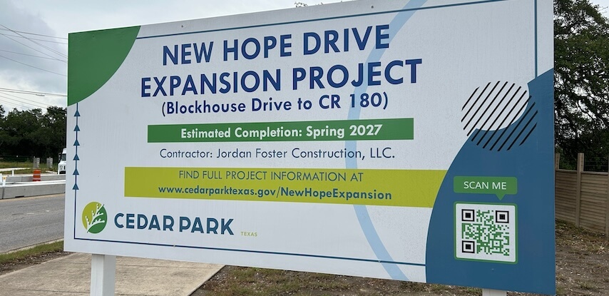 Photo of Cedar Park capital projects sign with QR code to learn more.